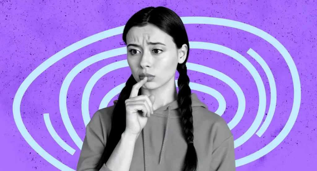 Femme pensive avec des nattes, faisant un geste de silence devant un fond violet et ondulé, exprimant la réflexion.