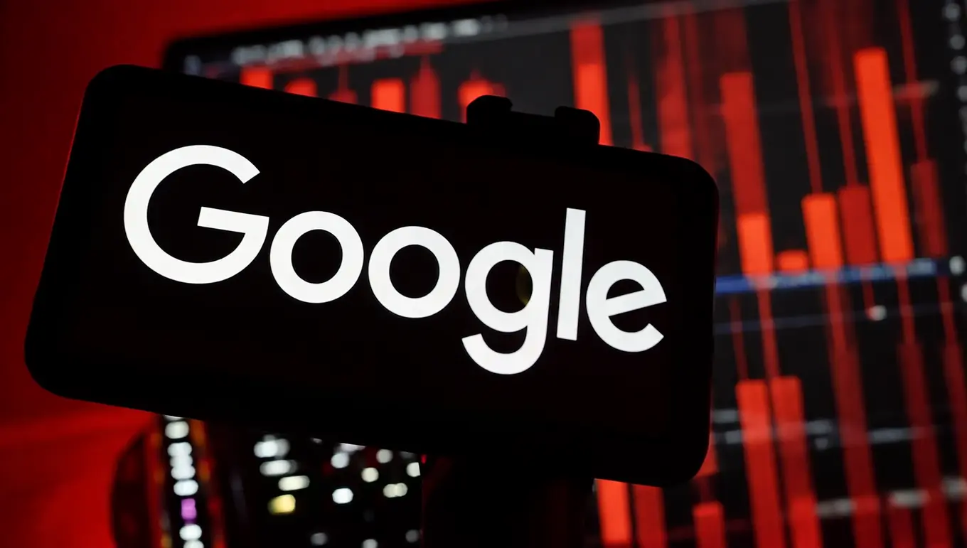 Logo de Google en premier plan, avec un graphique rouge flou en arrière-plan, symbolisant l'analyse de données.