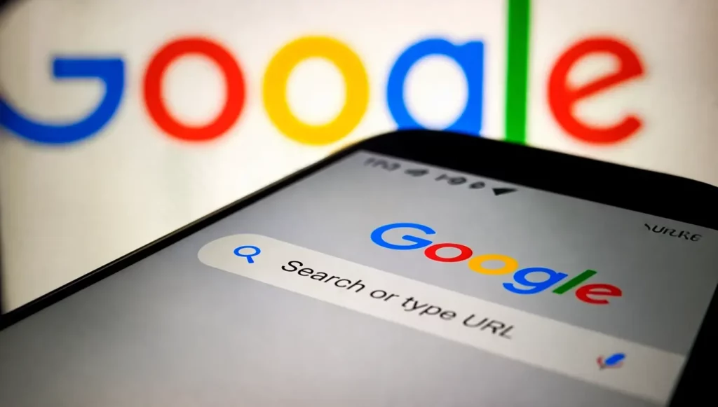 Écran d'un smartphone affichant le moteur de recherche Google avec un fond coloré.